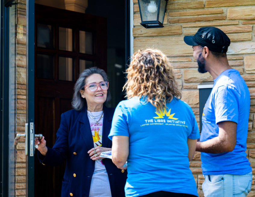 Volunteers with the LIBRE Initiative engage citizens.